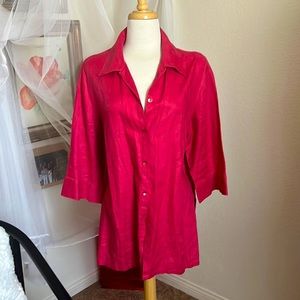 Mauve color, three-quarter sleeve button up shirt.